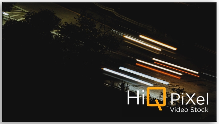 Car light trails at night in Jamaica, New York City